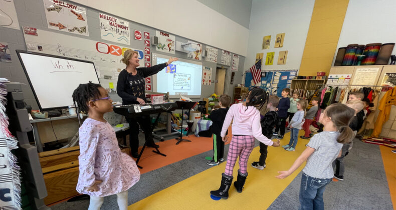 Students in music class dancing