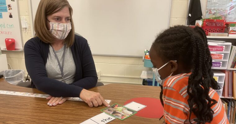 Teacher working with Ell student