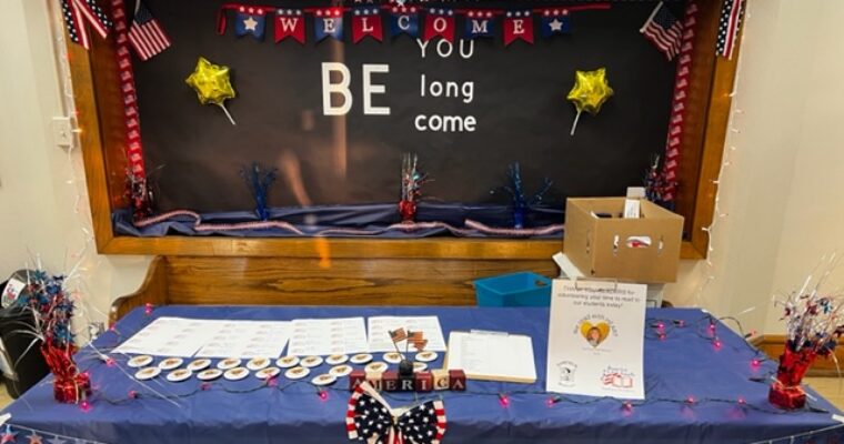 Table decorated in Red, white and blue for America Reads Day