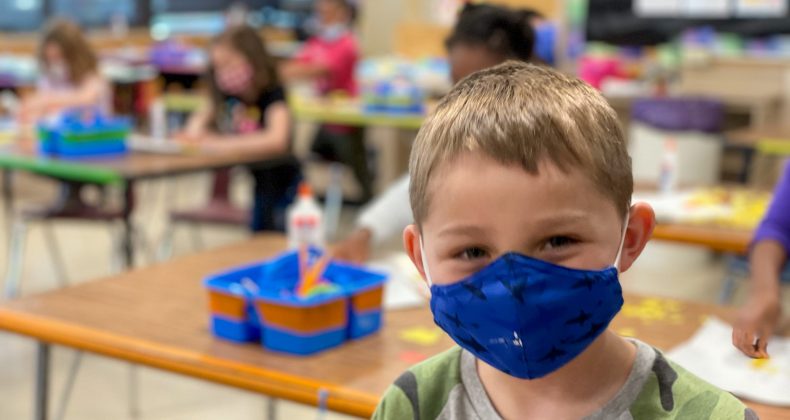 Student with a mask in a Grant Classroom