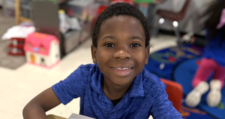 A smiling Grant student.