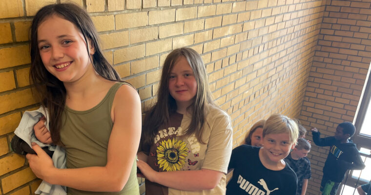 Students standing in stairwell