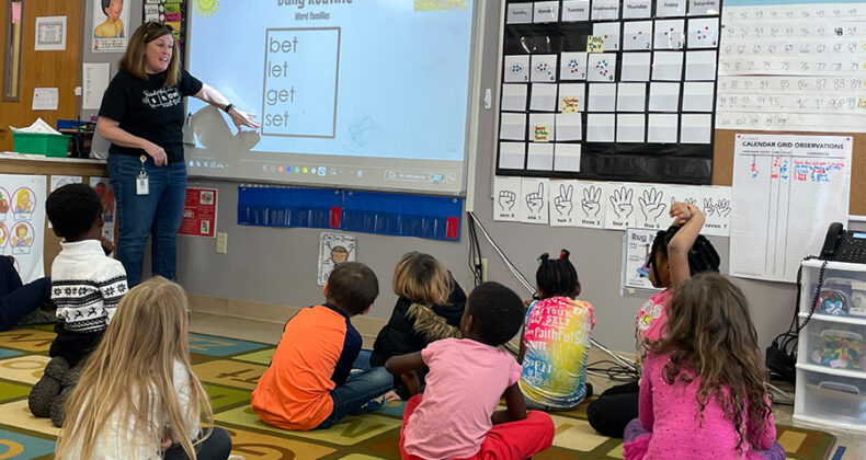 Kindergarten teacher at the whiteboard