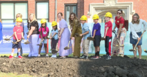 staff and students breaking ground of the New school