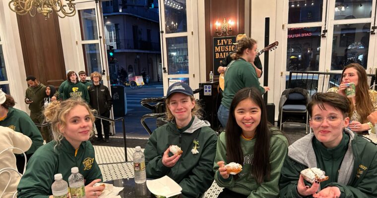 Kennedy students try beignets in the French Quarter, Louisiana