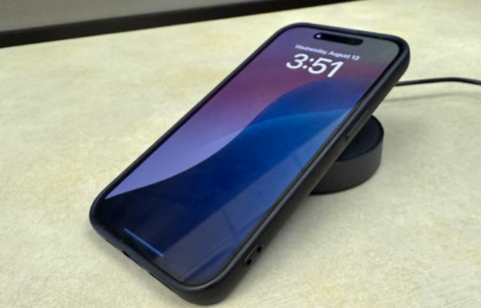 Personal Device and iphone sitting on the table.