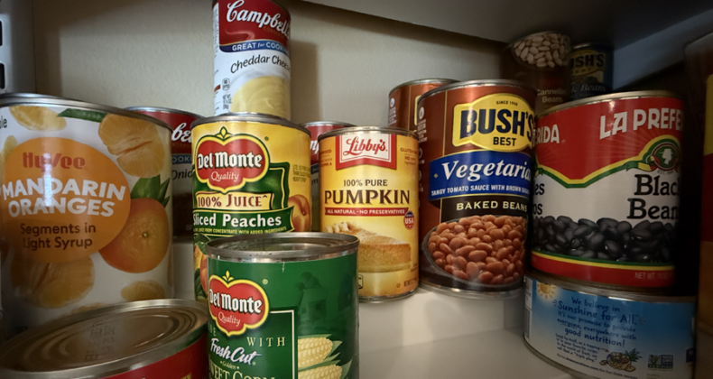 Shelves of can food items.
