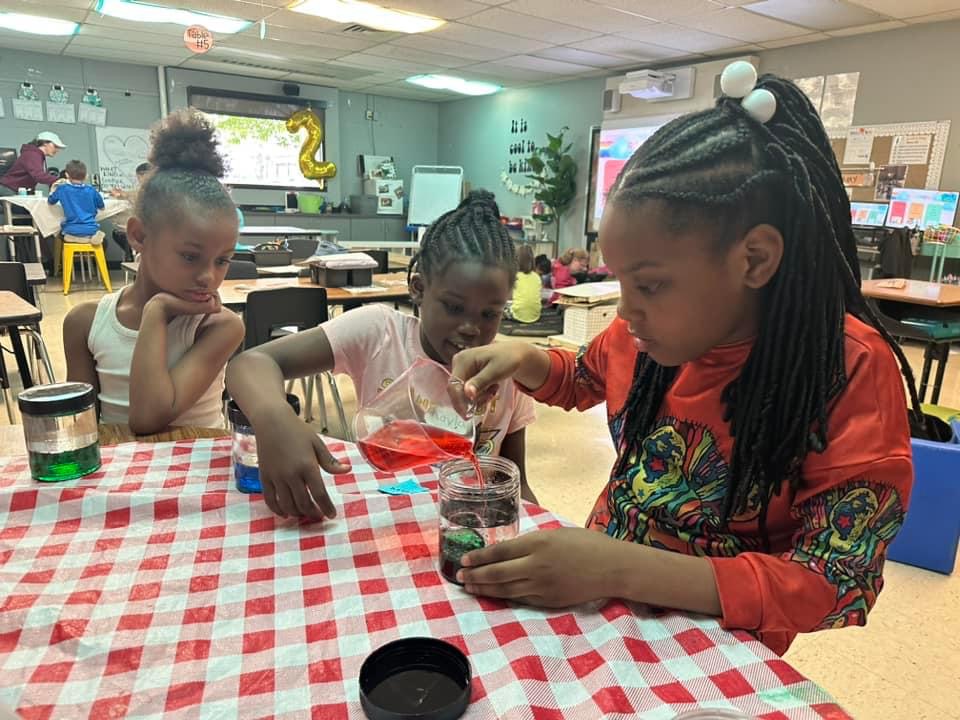 Girls doing an experiment