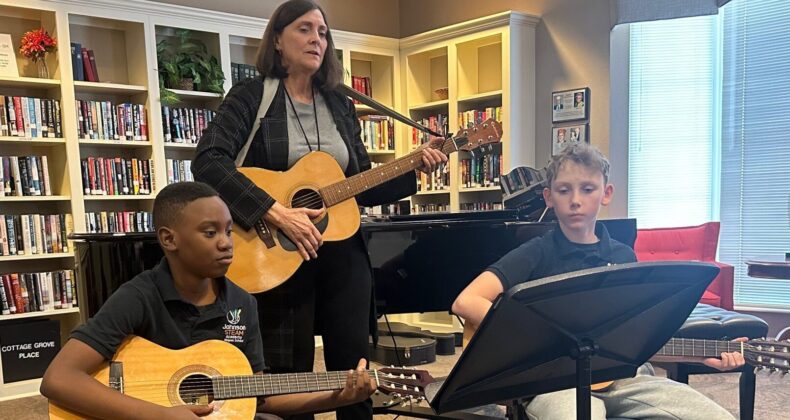 students playing guitar