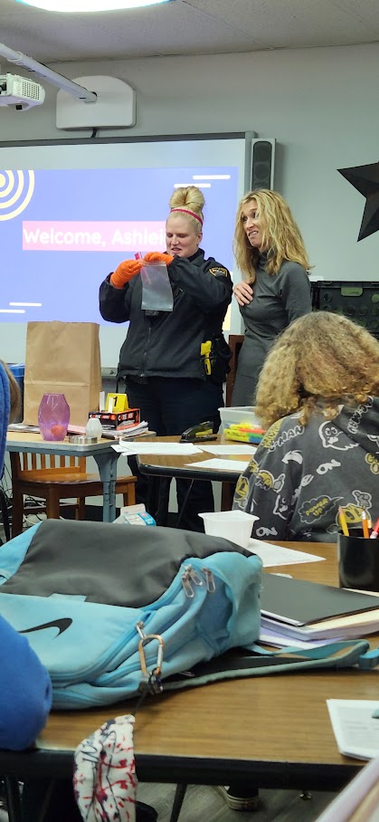Collecting hair samples in an evidence bag.