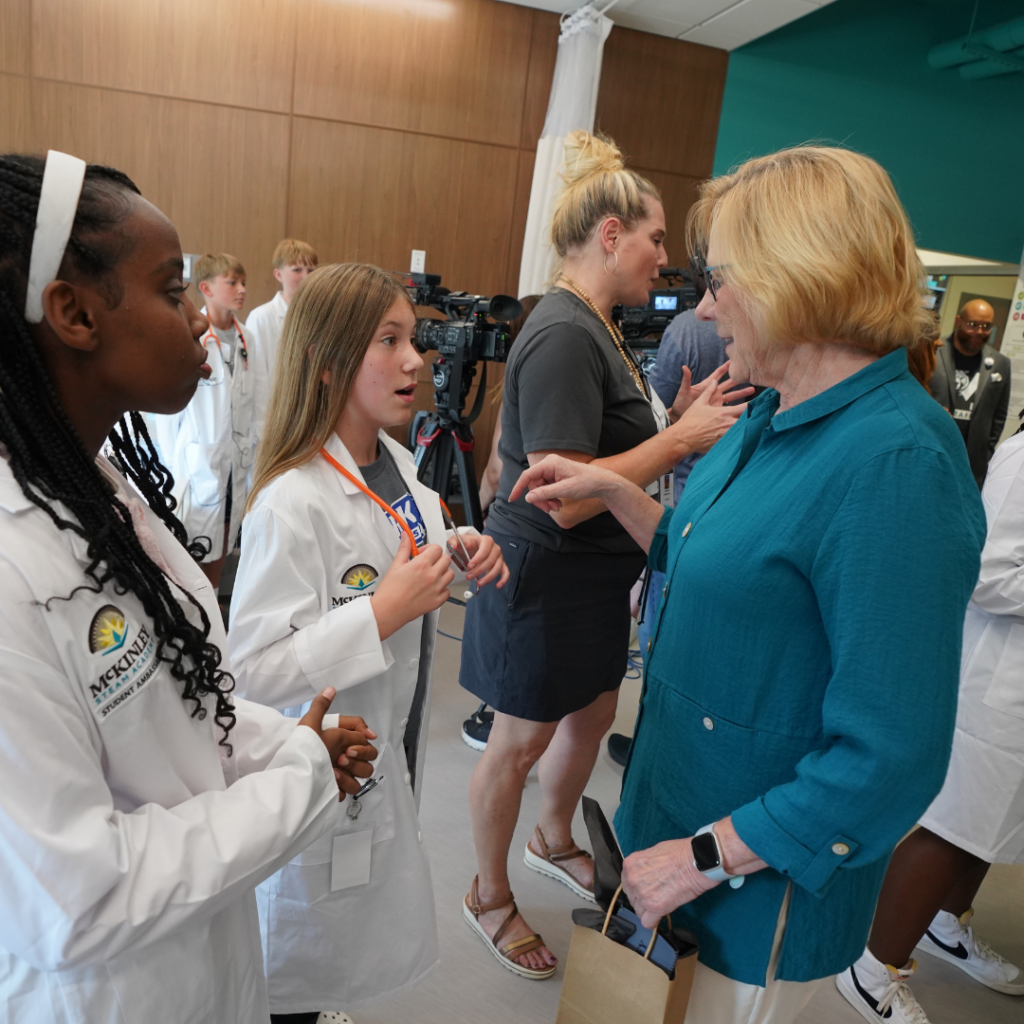 McKinley Med Lab students speak with school board president Cindy Garlock