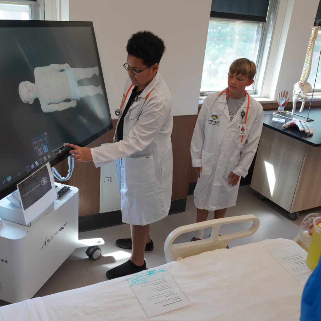 McKinley Med Lab students demonstrate how equipment works