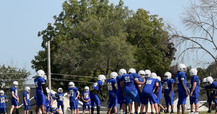 Wilson football players at practice