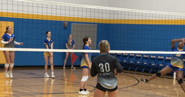 Wilson players in a rally