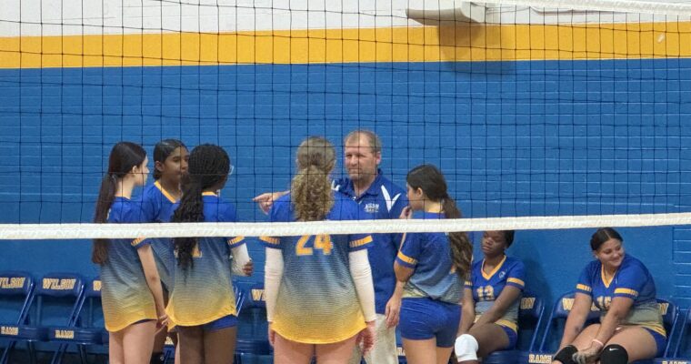 Wilson coach talking to players